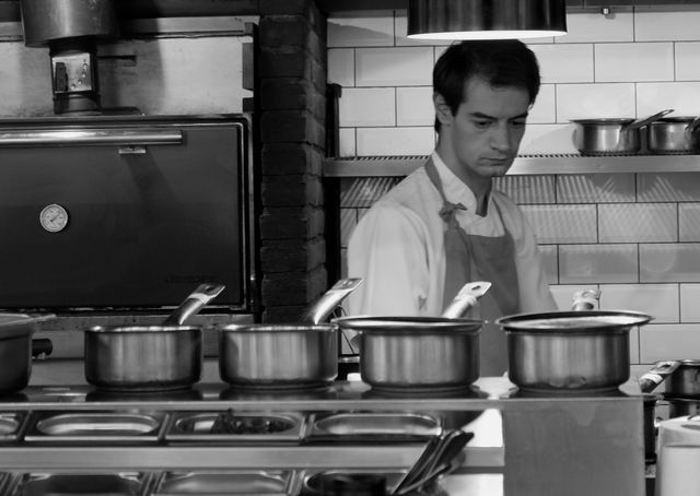 Koch in einer Restaurantküche